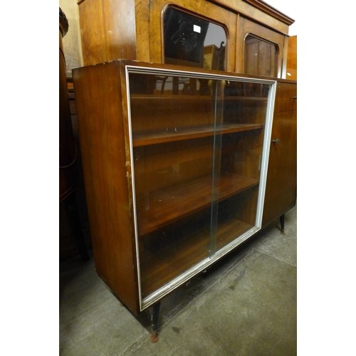 114 - A G-Plan teak bookcase and a walnut bookcase