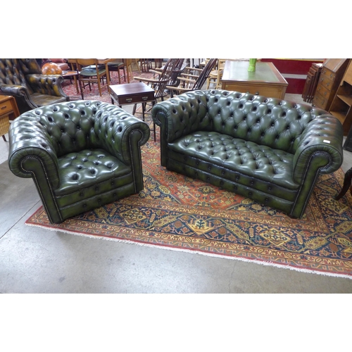 12 - A green leather Chesterfield settee and matching club chair