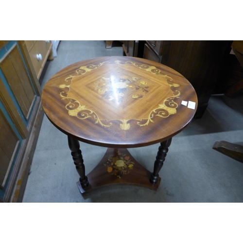 156 - An Italian Sorrento ware mahogany and marquetry effect circular occasional table