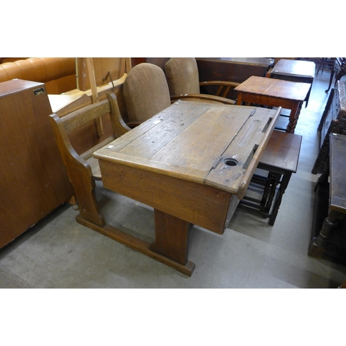 174 - An early 20th Century oak child's school desk