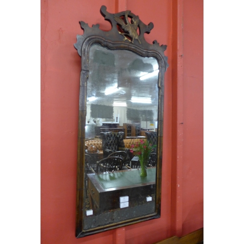 19 - A George II mahogany and parcel gilt framed mirror