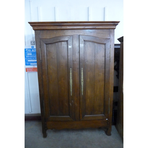 216 - An 18th Century French provincial fruitwood armoire