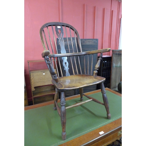 3 - A 19th Century elm Windsor chair