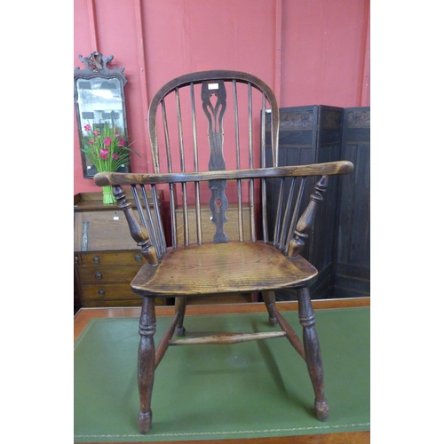 3 - A 19th Century elm Windsor chair