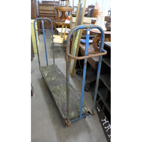 303 - An industrial steel platform trolley