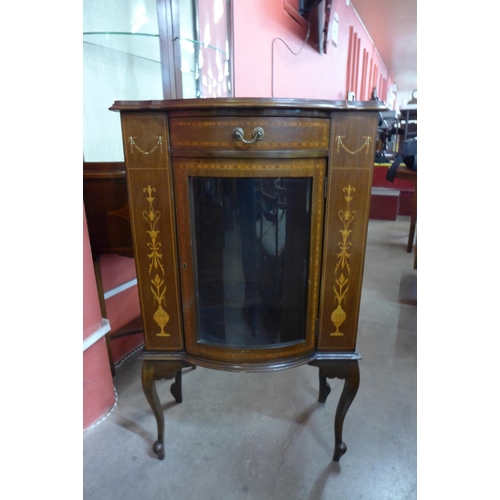 33 - An Edward VII inlaid mahogany bow front side cabinet