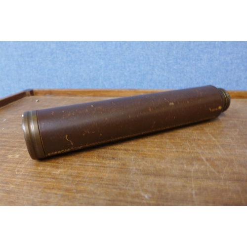 390 - A brown leather and brass telescope