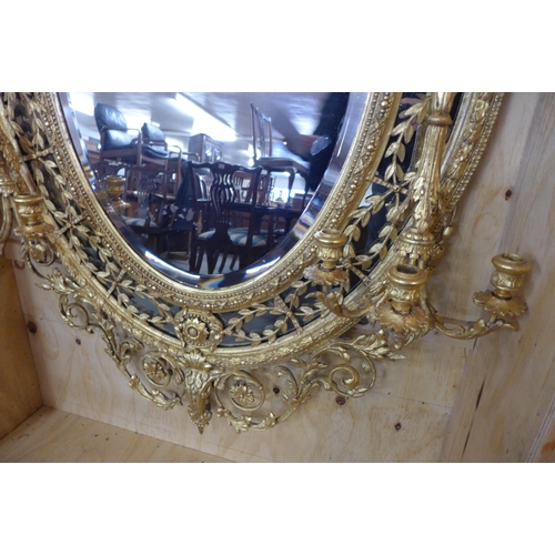 41 - A large Regency giltwood and gesso girandole mirror, 176 x 105 cms