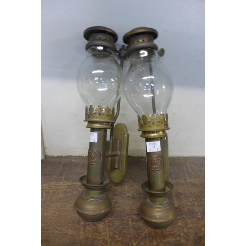 427 - A pair of brass ship's lamps, bearing White Star, Liverpool badges