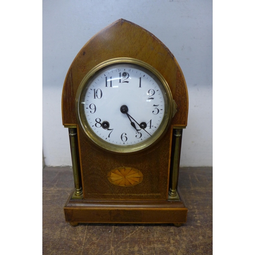 433 - An early 20th Century American inlaid mahogany mantel clock