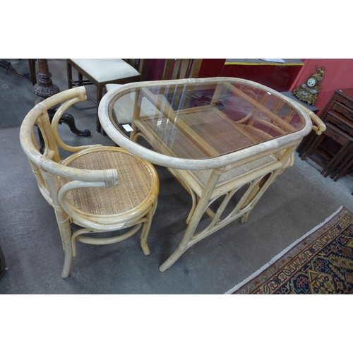 83a - A bamboo and rattan table and two chairs