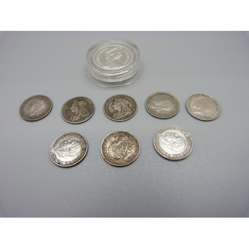 1000 - A silver £1 coin and eight silver threepences including 1901