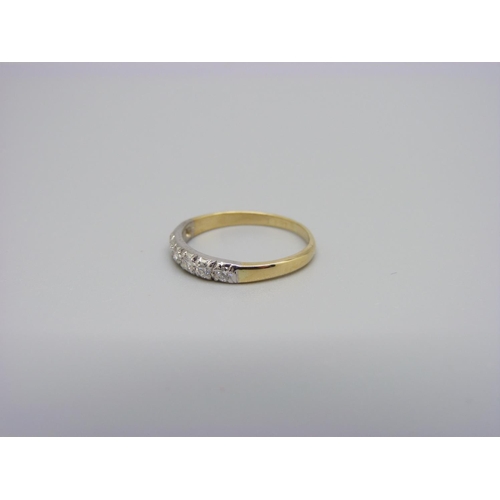 1003 - An 18ct gold, seven stone diamond half eternity ring, 2.2g, O