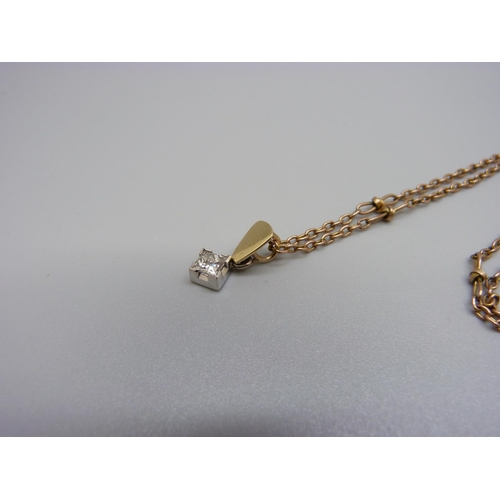 1017 - A yellow and white metal set diamond pendant, approximately 0.5carat diamond weight, on a 9ct gold c... 