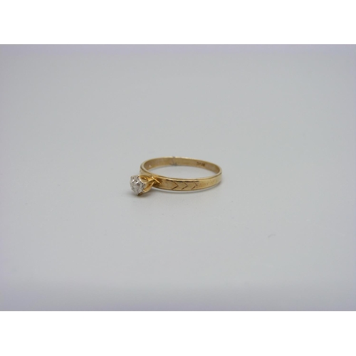 1030 - A 10kt gold and diamond ring, 1.4g, N