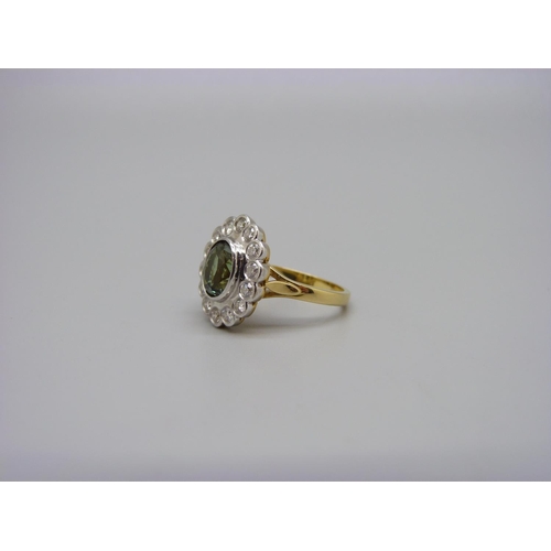 1030a - An 18ct gold, Alexandrite and diamond cluster ring, 2.05 carat Alexandrite, approximately 0.5 carat ... 