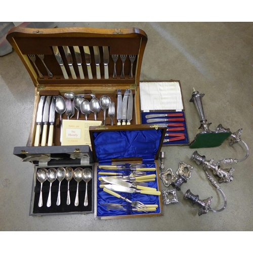 1254 - A collection of flatware including a canteen of cutlery and a candelabra**PLEASE NOTE THIS LOT IS NO... 