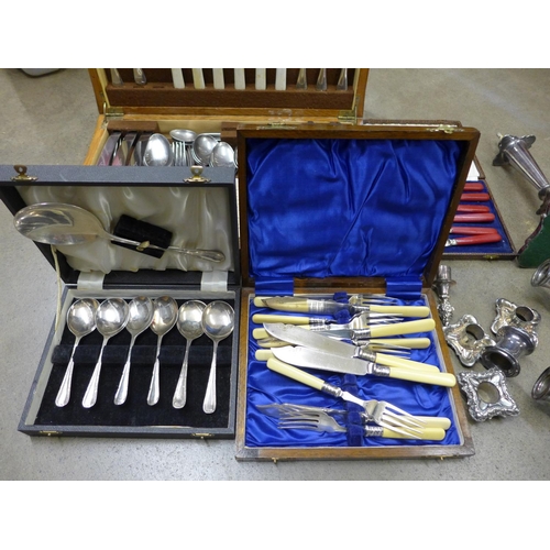 1254 - A collection of flatware including a canteen of cutlery and a candelabra**PLEASE NOTE THIS LOT IS NO... 