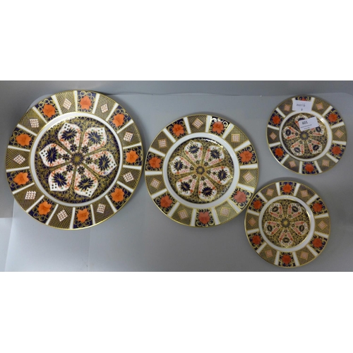 601 - Four Royal Crown Derby Old Imari plates, two second quality