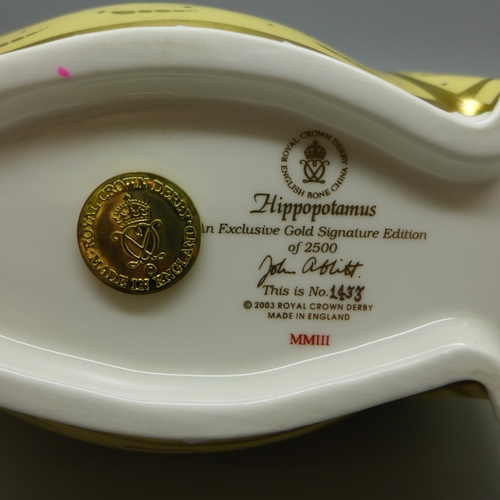 606 - A Royal Crown Derby paperweight, Hippopotamus, an exclusive Gold Signature Edition, this being  1,43... 