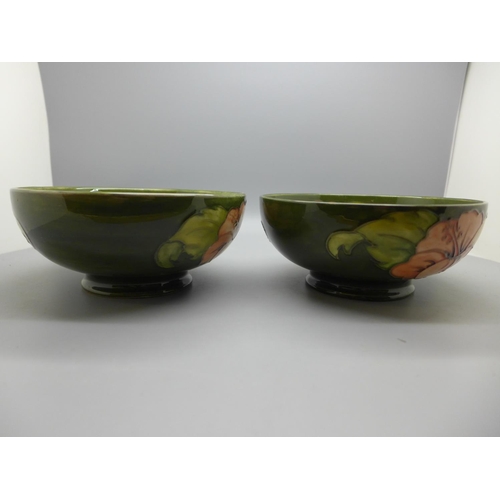 652 - A pair of Moorcroft green Hibiscus bowls