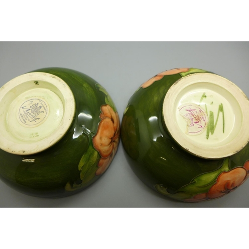 652 - A pair of Moorcroft green Hibiscus bowls