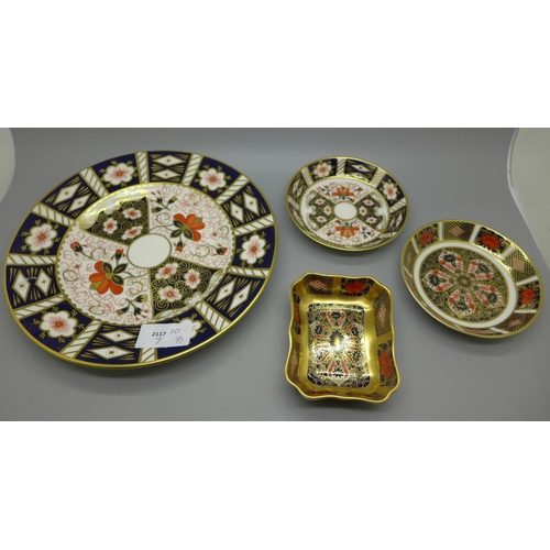 681 - A Royal Crown Derby 2451 pattern plate, two 1128 pattern pin dishes, round and rectangular and a 245... 