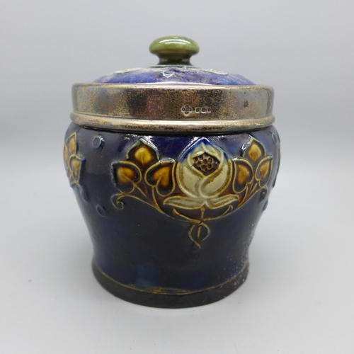 686 - A silver rimmed Royal Doulton tobacco jar