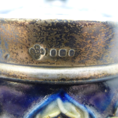 686 - A silver rimmed Royal Doulton tobacco jar