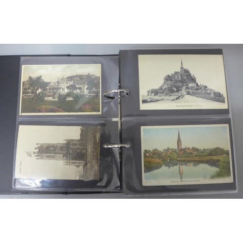 687 - An album of Edwardian and later postcards, approximately 100