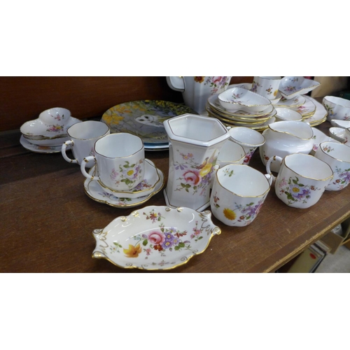 707 - A collection of Royal Crown Derby, Derby Posies including eight coffee cups and saucers, plates, dis... 