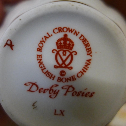 707 - A collection of Royal Crown Derby, Derby Posies including eight coffee cups and saucers, plates, dis... 