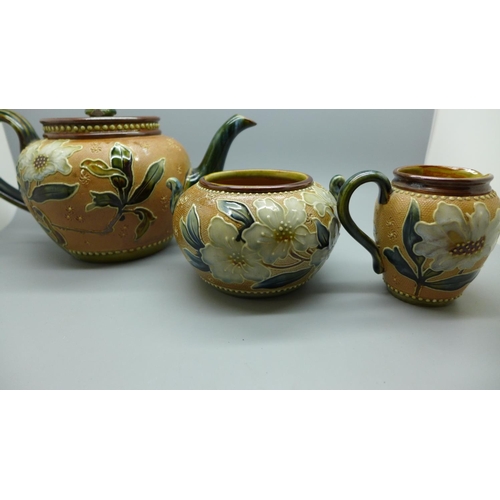 708 - A Royal Doulton salt glaze three piece tea service