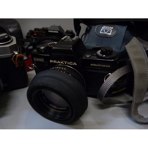 804 - Five 35mm film cameras, Olympus OM10 with 50mm lens, Miranda MS-2 Super with MC Macro lens, a Chinon... 