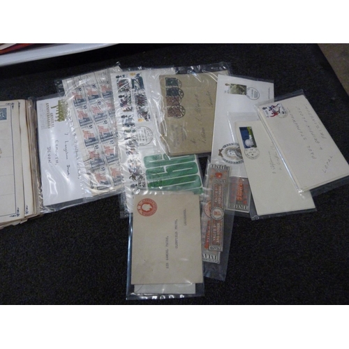 814 - A collection of stamps, loose and in albums, including a Cape triangle and a collection of first day... 