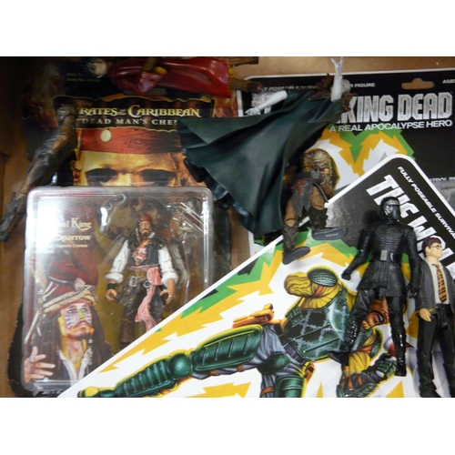 842 - A collection of figures, boxed including Pirates of the Caribbean, Harry Potter, Walking Dead and Lo... 