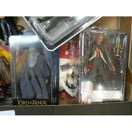 842 - A collection of figures, boxed including Pirates of the Caribbean, Harry Potter, Walking Dead and Lo... 