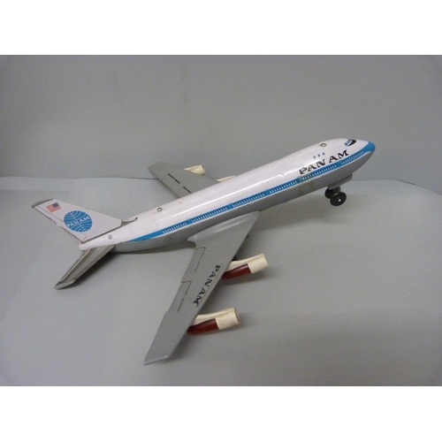 849 - A Japanese (Asahi) tin plated and plastic battery operated Pan Am airliner