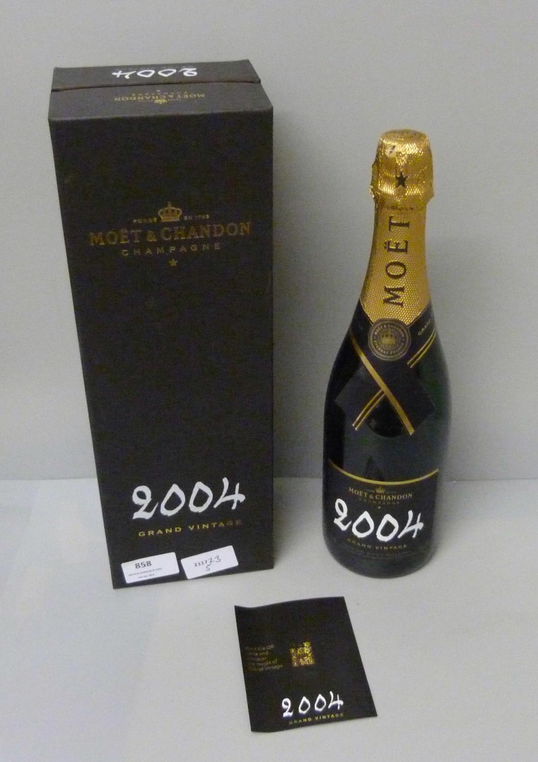A bottle of Moet and Chandon 2004 Grand Vintage champagne, boxed