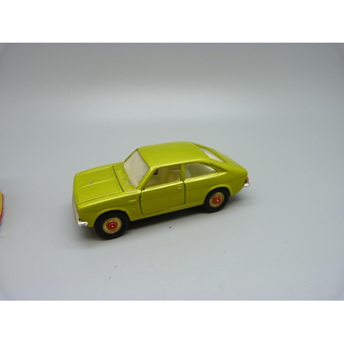 884 - A Corgi Toys Whizz Wheels 306 Morris Marina 1.8 Coupe, with red wheels, boxed