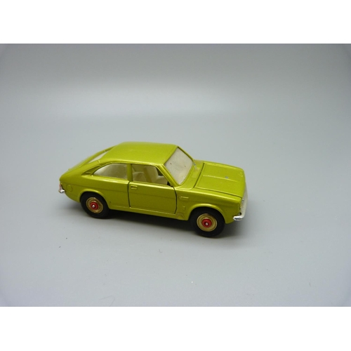 884 - A Corgi Toys Whizz Wheels 306 Morris Marina 1.8 Coupe, with red wheels, boxed