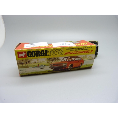 884 - A Corgi Toys Whizz Wheels 306 Morris Marina 1.8 Coupe, with red wheels, boxed