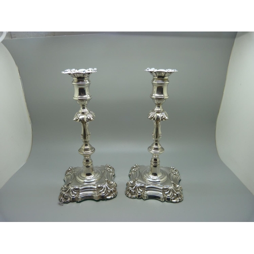 894 - A pair of William IV silver candlesticks, Sheffield 1834, 22.5cm