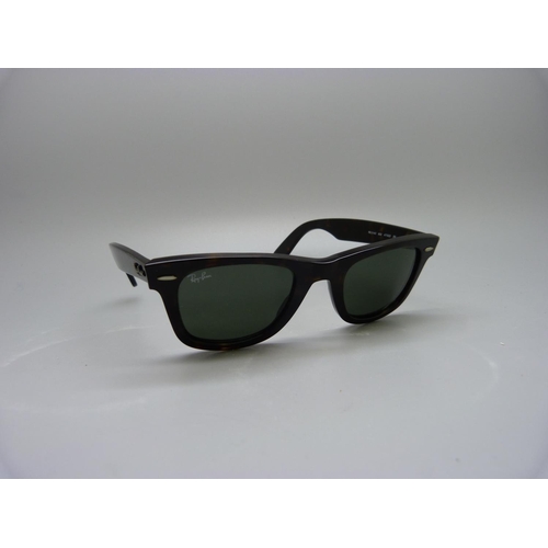 928 - A pair of Ray-Ban Wayfarer sunglasses, style no. RB2140, with case