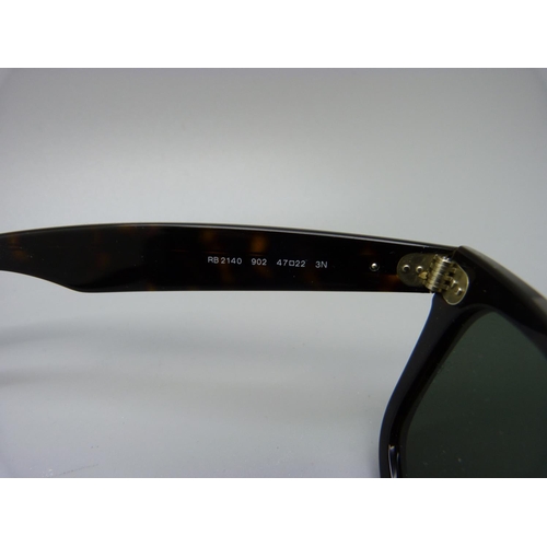 928 - A pair of Ray-Ban Wayfarer sunglasses, style no. RB2140, with case