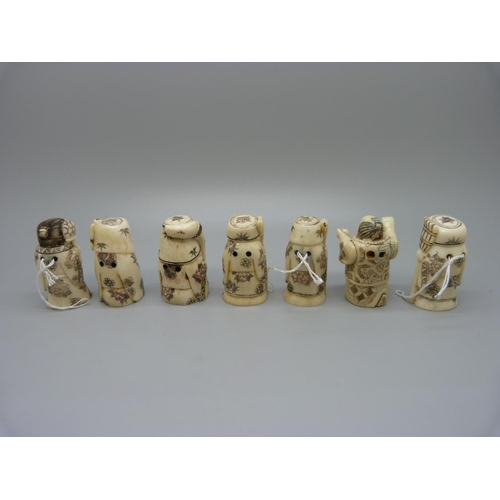 931 - Seven carved figurines