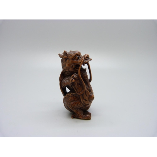 945 - A netsuke, dragon