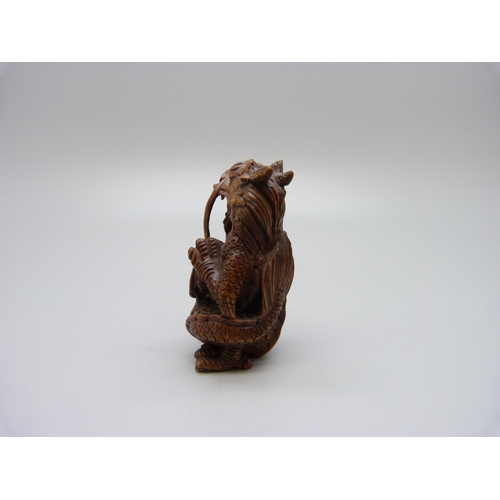 945 - A netsuke, dragon