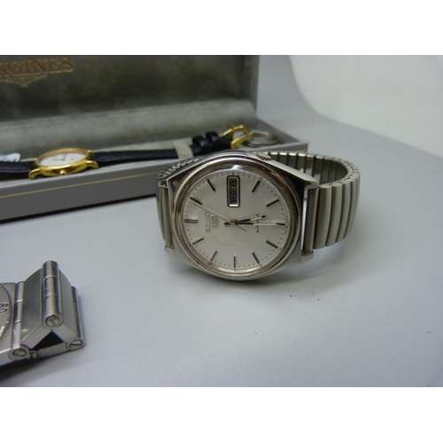 962 - A Seiko 5 automatic date wristwatch, a lady's Longines quartz wristwatch and other watches