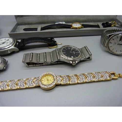 962 - A Seiko 5 automatic date wristwatch, a lady's Longines quartz wristwatch and other watches